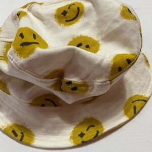 Molo Cream Bucket Hat with Yellow Smiley Faces